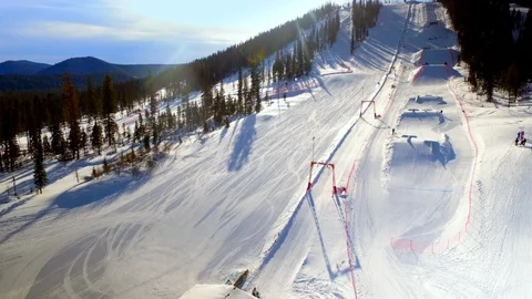Flying on top of ski resort base Stock Footage 109113126