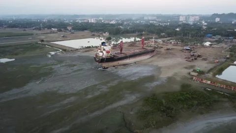 Flying toward a beached ship on a ship breaking yard at the coast of Bangladesh Video stock 327166238