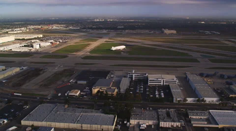 Flying toward blimp on field at Long Beach Airport. Shot in 2010. Stock Footage 59113703