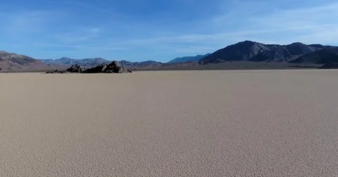 Flying toward The Grandstand on the Racetrack playa in Death Valley, California Stock Footage