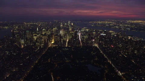 Flying toward Midtown Manhattan at dusk with Central Park in foreground, looking Stock Footage 59529741