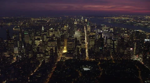 Flying toward Midtown Manhattan East at night, crossing Fifth Avenue with Empire Stock Footage 59170602