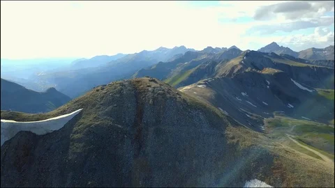 Flying toward mountain top trail  스톡 동영상 87621611