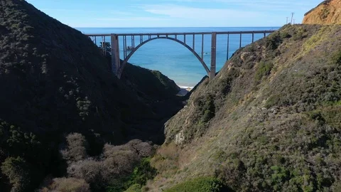 Flying Toward the Ocean Under the Bixby Bridge Stock Footage 112839798