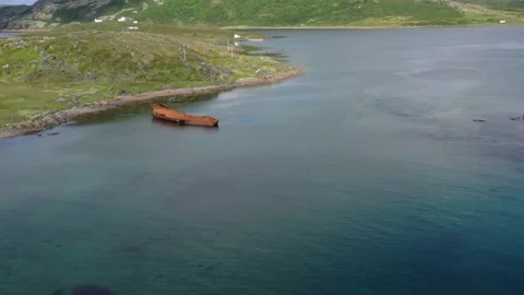Flying toward an old ship wreck Stock Footage 156631402