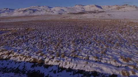 Flying toward secret mountain base Stock Footage 82880792