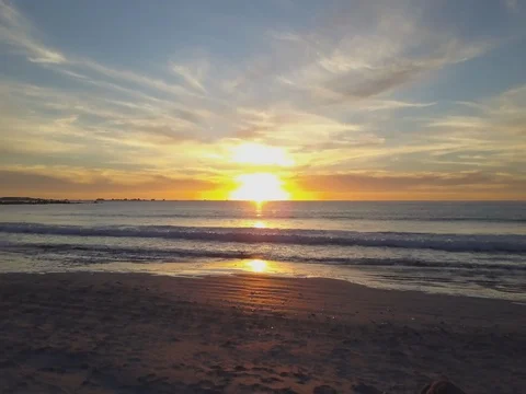 Flying Towards Bright Orange Sunset over the Ocean Stock Footage 79167420