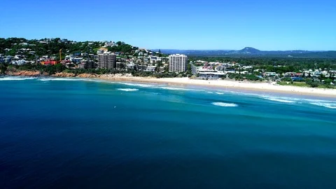 Flying towards coast town Stock Footage 99783817