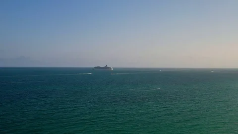 Flying Towards the Horizon and Chasing a Cruise Ship Stock Footage 103292521