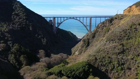 Flying Towards the Ocean Over Bixby Bridge Stock Footage 112841139