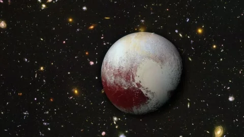 Flying Towards Planet Pluto In Our Solar System Surrounded By Colorful Galaxies Stock Footage 265981440