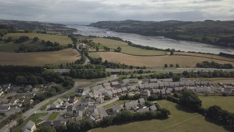Flying Towards the River Teign in Devon over Housing Estate Vídeo Stock 120249029