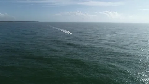Flying towards the speedboat and passing by Stock Footage 311328454
