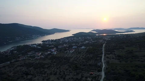 Flying towards a sunset over Adriatic sea Stock Footage 100723329