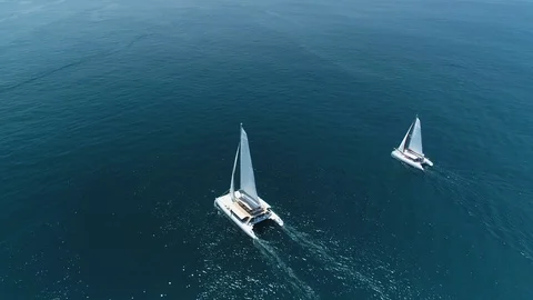 Flying Towards two Sail Boats Stock Footage 123257561