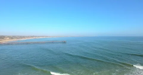 Flying towards Ventura's pier along Surfers Point Stock Footage 73099344