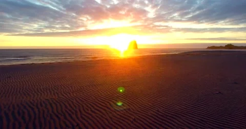 Flying towards the waves at sunset (aerial) (Lincoln City, OR) Stock Footage 67712083