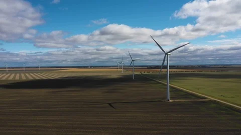 Flying towards windmill in a wind farm Stockbeeldmateriaal 101000236