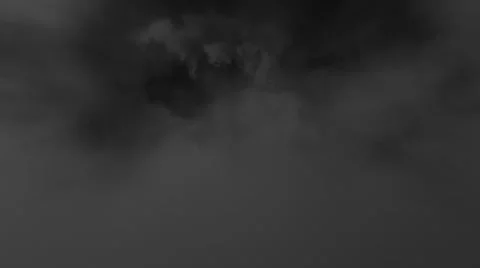 Flying trough cloud tunnel lit with storm lightning flashes looped Stock Footage 68276231