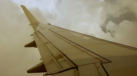 Flying trough storm clouds. airplane window view. travel background Stock Footage 40669727