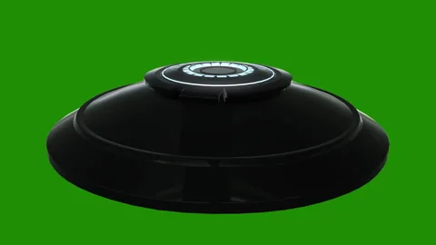 Flying UFO on green background Loop video Stock Footage 256609218