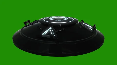 Flying UFO on green background Loop video Stock Footage 256609716