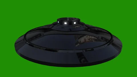 Flying UFO on green background Loop video Stock Footage 256610338
