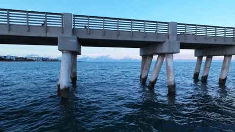 Flying Under Beach Pier With Ocean 4K Drone Cinematic Shot Stock Footage 292059101
