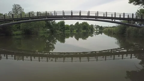 Flying under a bridge Stock Footage 129309875