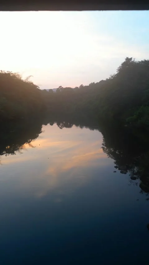 Flying under bridge, over River, Drone Stock Footage 235614127