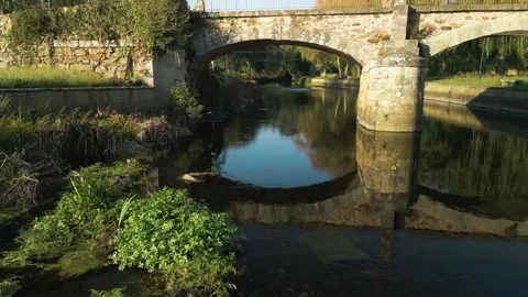 Flying Under The Old Stone Bridge Spanning The Anllons River  - aerial Stock Footage 254945730
