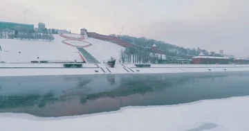 Flying under the river, walls and towers of the Nizhny Novgorod Kremlin. Dawn ov Stock Footage 85700545