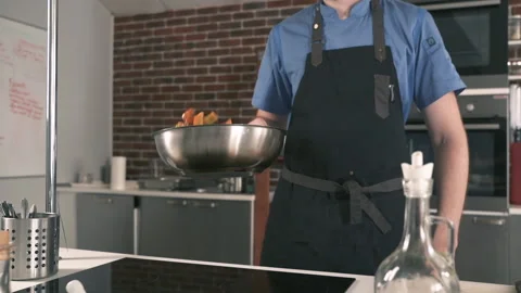 Flying Vegetables In Frying Pan. Chef Cooking Delicious Food Restaurant Kitchen. Stock-Footage 142807794