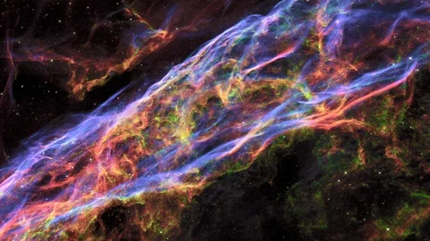 Flying into the Veil Nebula in Outer Space, also known as NGC 6960. Vídeo Stock 129761505
