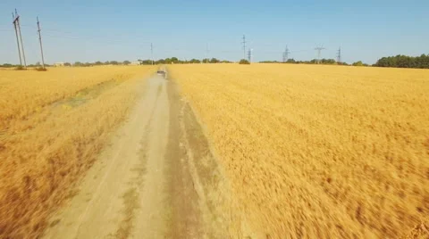Flying vertically above car driving on road 库存影片 61147827
