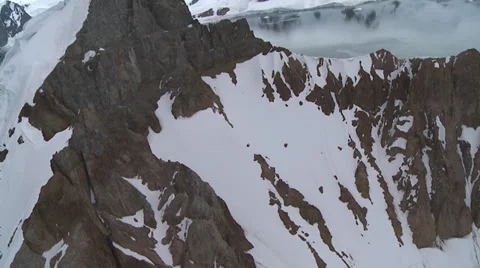 Flying very close to mountain peak, Antarctica Stock Footage 34314325