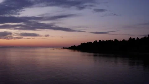 Flying Very Fast Over Calm Peaceful Great Lakes At Dawn Sunrise, Aerial Drone Stock Footage 137657895