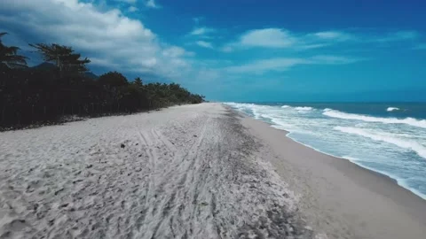Flying in a virgin Beach in Colombia Stock Footage 130218680