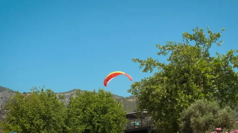 Flying weekend with parasailing. 動画素材 244605798
