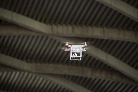 Flying white drone Stock Photos