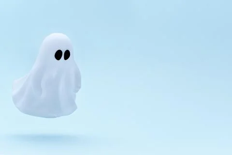Flying white ghost toy on a gradient blue background. Stock Photos