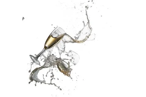 Flying wine glasses with poured alcohol Stock Photos