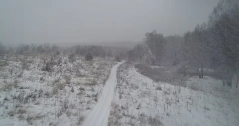 Flying on a winter road Stock Footage 147190720