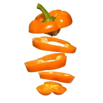 Flying yellow paprika. Sliced floating pepper isolated. Levity vegetable. Stock Photos