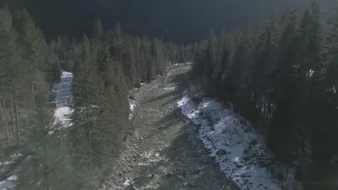 A flyover of an alpine river, captured in D-Log for flexible post-production 動画素材 301603397