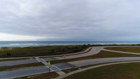Flyover to Atlantic Ocean Beach Stock Footage 102793524