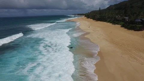 Flyover Beach in Hawaii with Big Waves Stock Footage 100143375