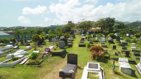 Flyover Close To Weathered Gravestones At Leapers Hill Cemetery In Grenada Stock Footage 342356269