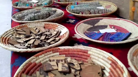 Flyover of colorful serapes, blankets, baskets, bowls, plates, etc, Santa Fe, NM 動画素材 196201818