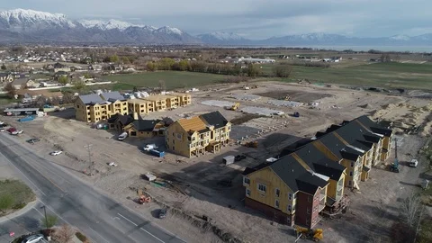 Flyover of Construction Site of Planned Community Near Farmland in Utah 스톡 동영상 88327391